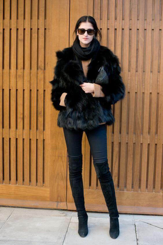 Faux fur coat will always keep you cozy, no matter what temperature is. Style it with jeans and thigh-high boots for your working hours.