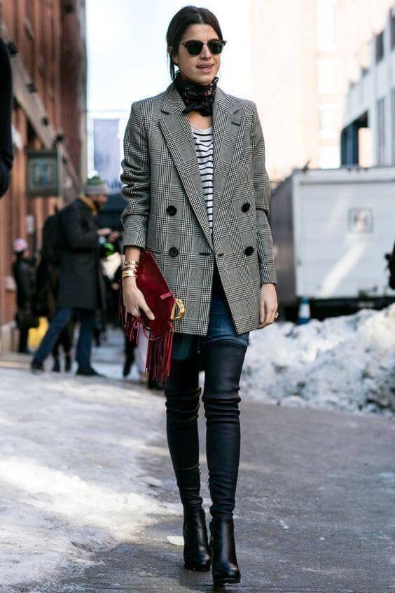 Tailored blazer in combination with jeans and the striped blouse looks absolutely man inspired. However, this combination has a woman inspired finish - over the knee boots. They will give you bold, very appropriate look for the office. Don’t forget to add details such as a scarf or red clutch.