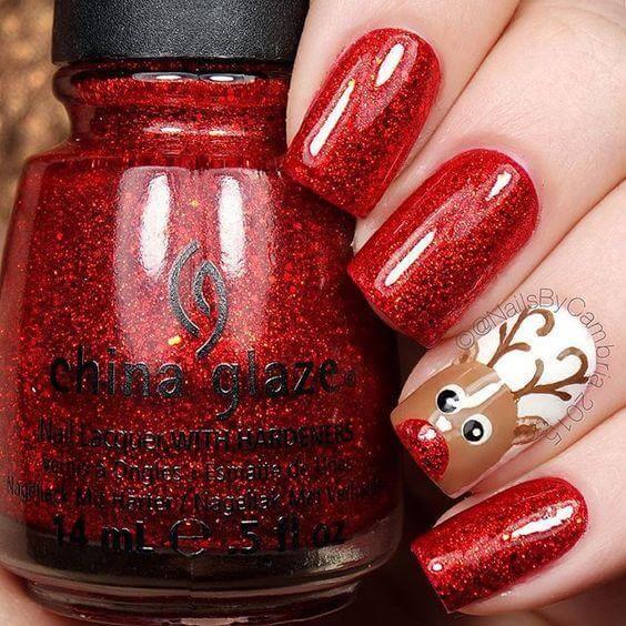 Let your deer be seen on your ring finger by leaving that finger white, instead of red. #winternails #naildesign