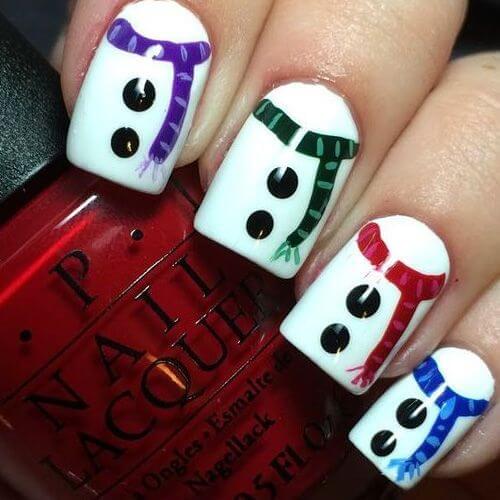 Reviving snowman on your nails is a cute and unique idea. You can absolutely go with this kind of design for the winter holidays. #winternails #naildesign