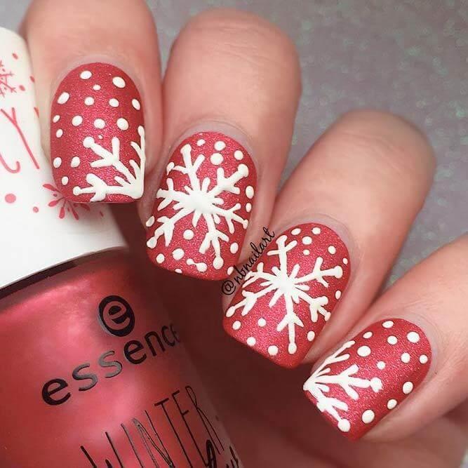 If you want winter to come earlier, invite it with snowflakes on your nails. Red is an excellent choice to match with white. #winternails #naildesign