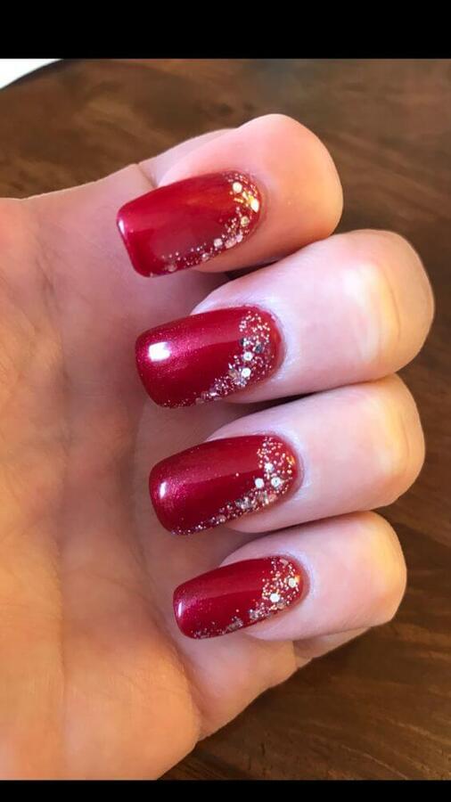 Even without design in Christmas spirit, this manicure in red and with sparkly details can make you shine wherever you go. #winternails #naildesign