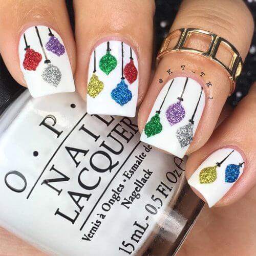 Having colorful Christmas lights on your nails can seem nothing less than perfect! #winternails #naildesign