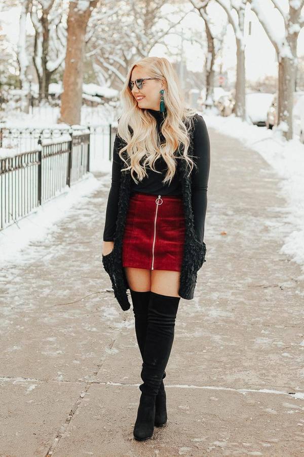 Corduroy is an ideal material to wear in the winter time. It will keep you cozy while providing you a retro, stylish look. This girl opted for mini corduroy skirt, black turtleneck, and faux fur vest. #bootsoutfit #nighout #nightoutlook