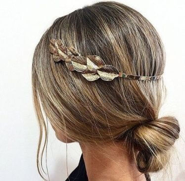 Try this simple do with a bun and an accessory.