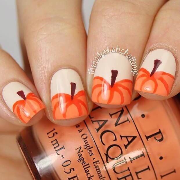 Cute pumpkin nails for fall.