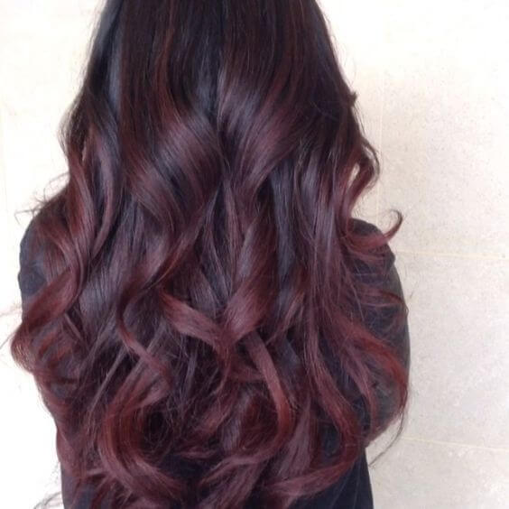 Dark brown hair with dark red highlights