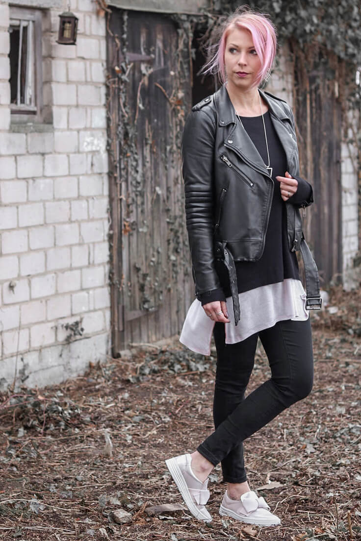 Woman in dark leather jacket