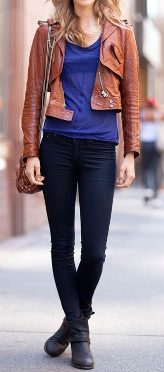 An eye-catching brown leather jacket takes an ordinary street look to new style heights.