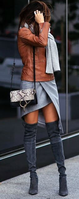 Wrap up in layers of gray to show off the earthy tones of rusty brown leather.