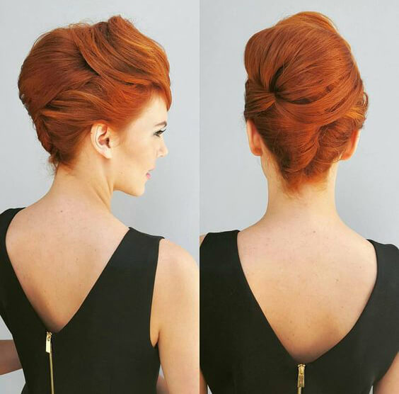 Channel your inner Joan Holloway with this layered twist updo.
