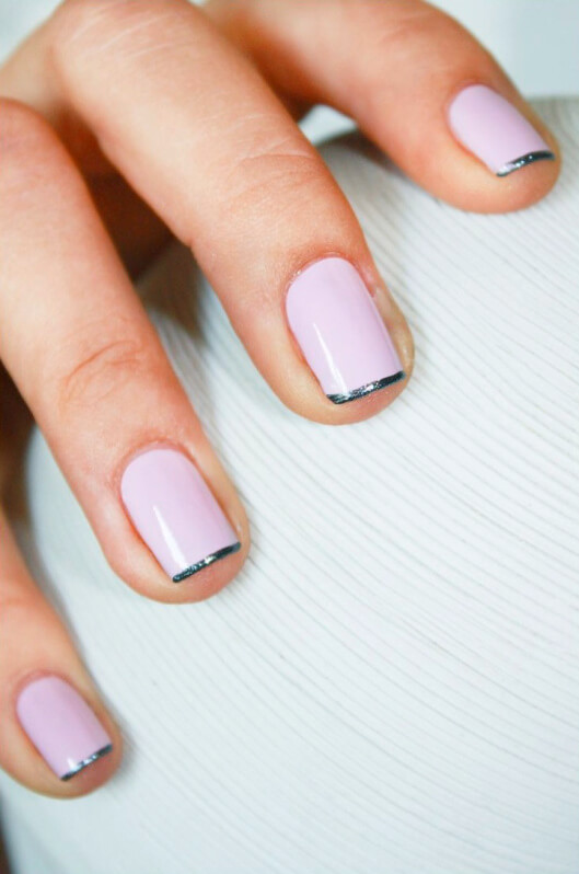 A fun way to add to your manicure is to use a shiny, iridescent polish on your tips.