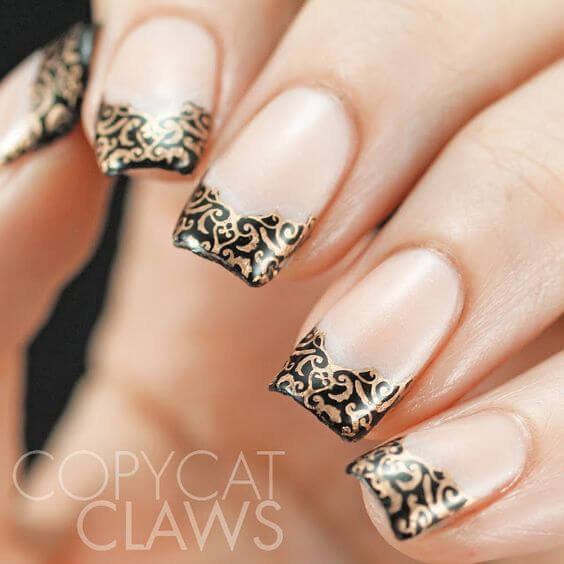 Stunning and artistic, these nails were inspired by intricate lace patterns.
