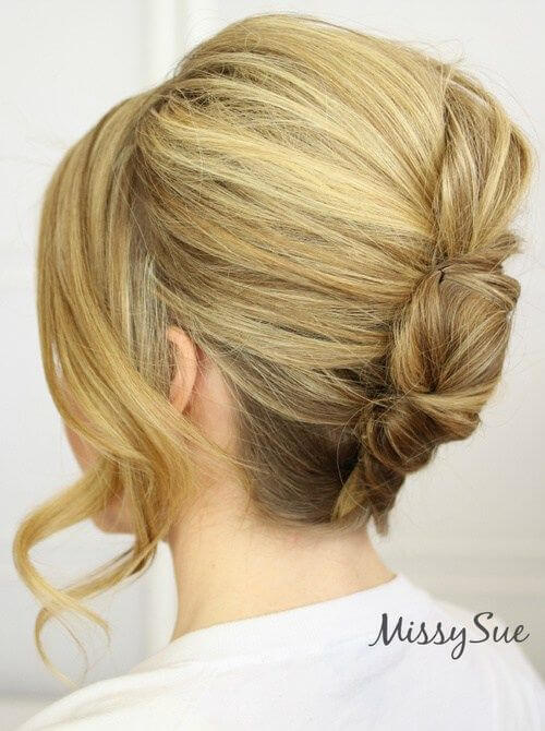 Leave a little hair out of the updo for an updated French twist.
