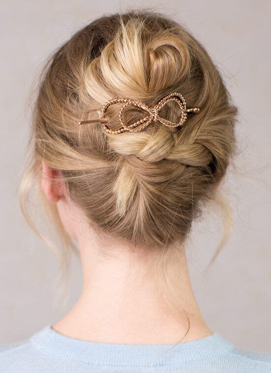 Combine a braided updo and a French twist to get this pretty updo that's easy to pull off.