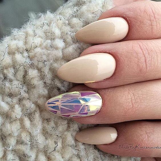Use chunky, triangular nail stickers to get this effect.