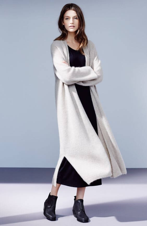 Classical black and white with a long cardigan for covering up.