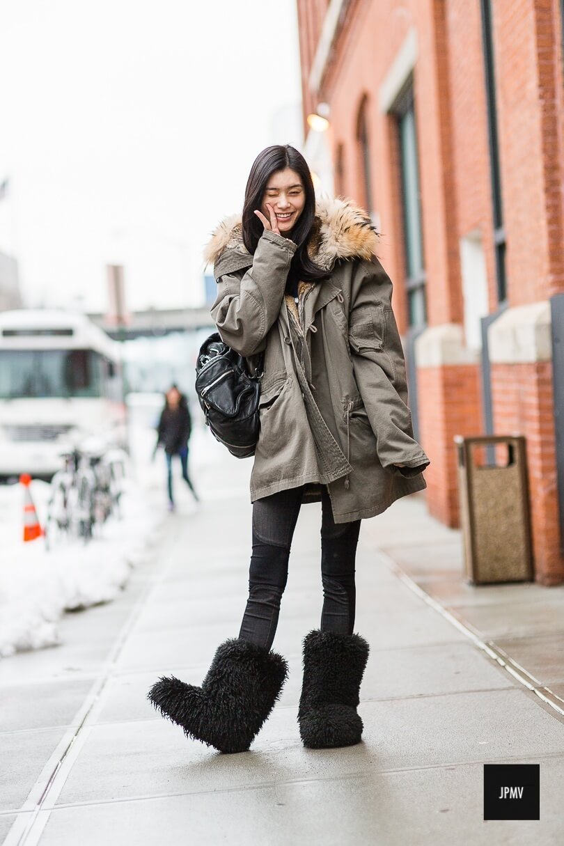 Fluffy boots add a fun element to any winter look.