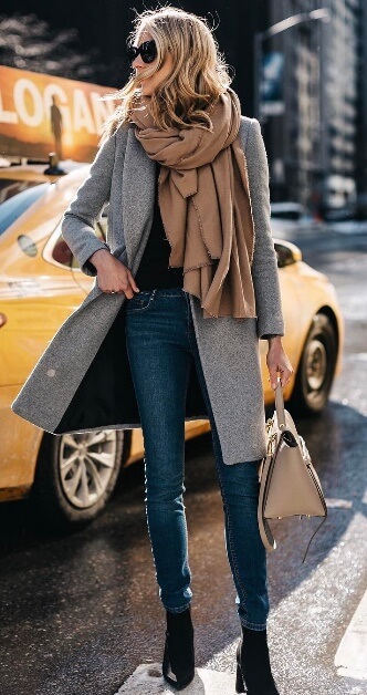 This look is all about sleek, elegant lines which slim and lengthen the frame. Then comes a chunky, oversized scarf to add bulk and comfort on top – simply sublime!