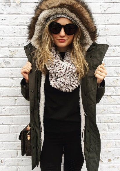 Faux fur never goes out of style, especially in chilly fall temperatures. Cover up Russian style with a fur-lined khaki parka and accessorize with an oversized black and white scarf for stellar style points.