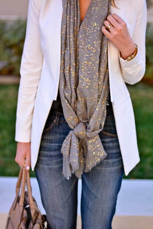 There’s always time for a bit of sparkle and fall fashion is no different. Take your spring gold-speckled scarf and knot it casually at the ends – chic and sophisticated in an instant.