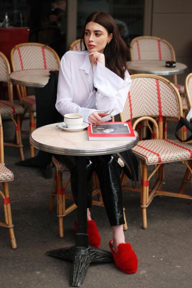 The posture that gives your photo a true Parisian-chic vibe. Take a seat at the nearest pedestrian cafe, cross your legs and order a drink.