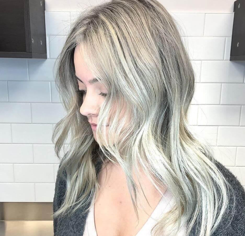 Layers and ash blonde hair go together like wine and cheese