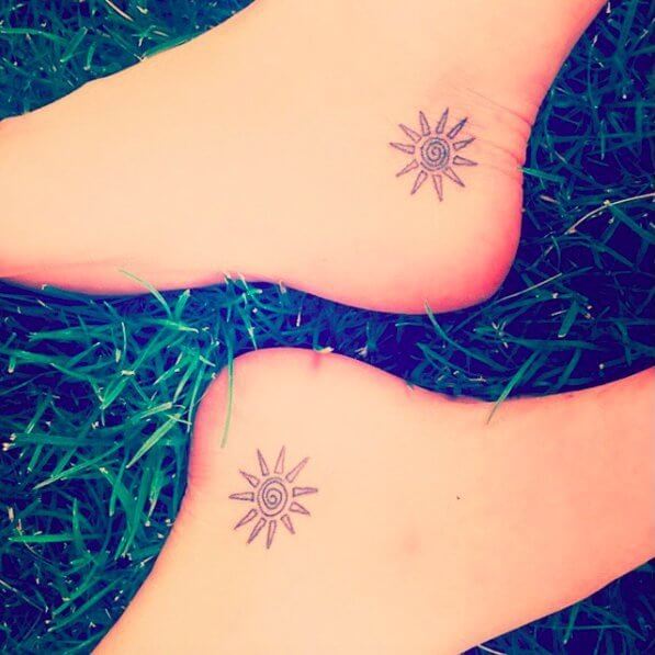 When you are opting for feet tattoos, you can never go wrong with sun, seashell or delicate wave. Make sure it is small and minimal. #summertattoo #minitattoo #minimalisttattoo #colorfultattoo