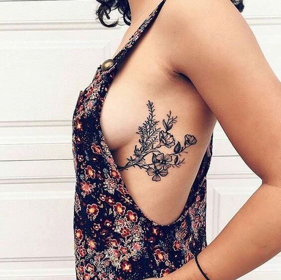 Floral tattoo style at this place on your body will make you a star of any event you decide to go #summertattoo #minitattoo #minimalisttattoo