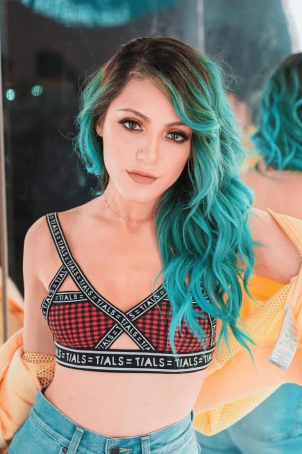 Go all out in this stunning teal hair color!