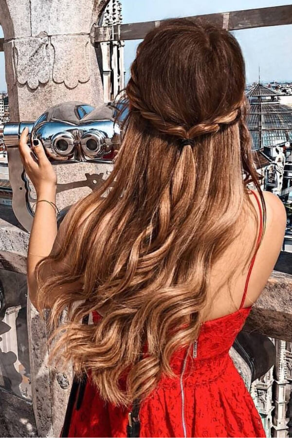 A twisted braid adds a romantic girly touch to your look.