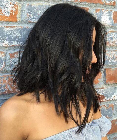 Warm black hair tones help your hair looks thick. If you have a short bob, opt for this color. #haircolor #warmblackhair