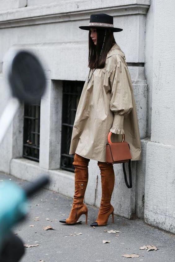 Although this silhouette is not suitable for everyone, oversized dress and thigh-high boots in the form of socks will make you look attractive. #highboots #winteroutfits
