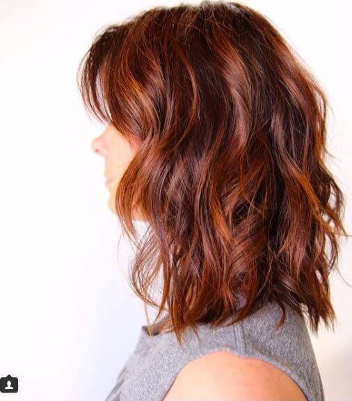 You will be amazed how perfectly auburn hair color looks when you do beach waves.