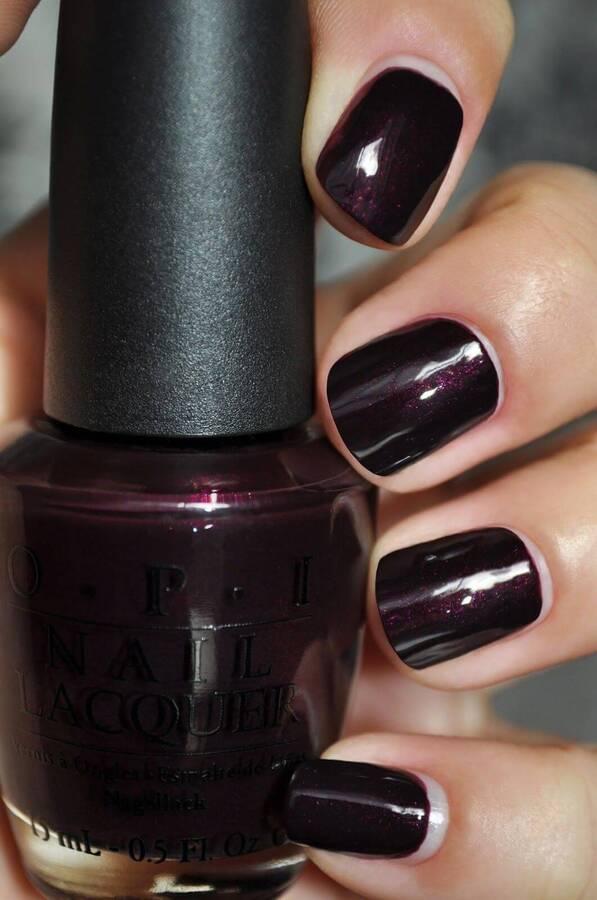 Nails with lovely purple shade with delicate shimmer