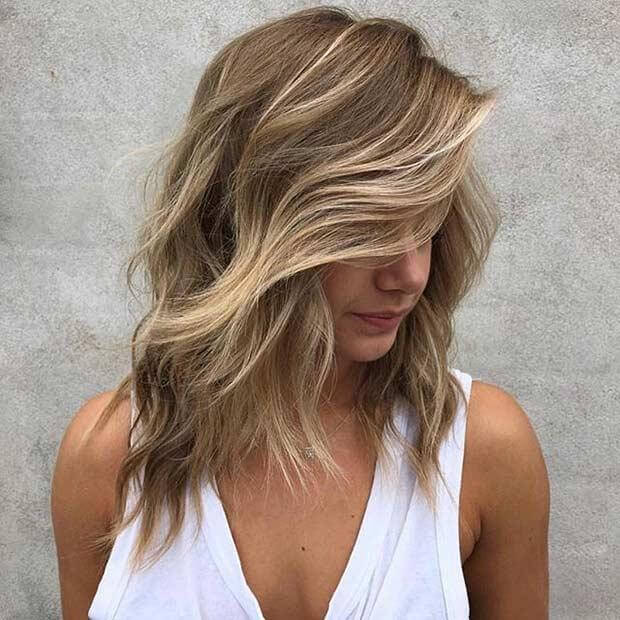 Voluminous Honey Blonde Hairstyle