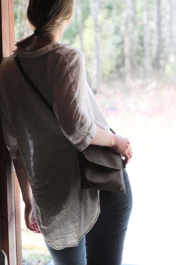 Woman in a beautiful white linen shirt