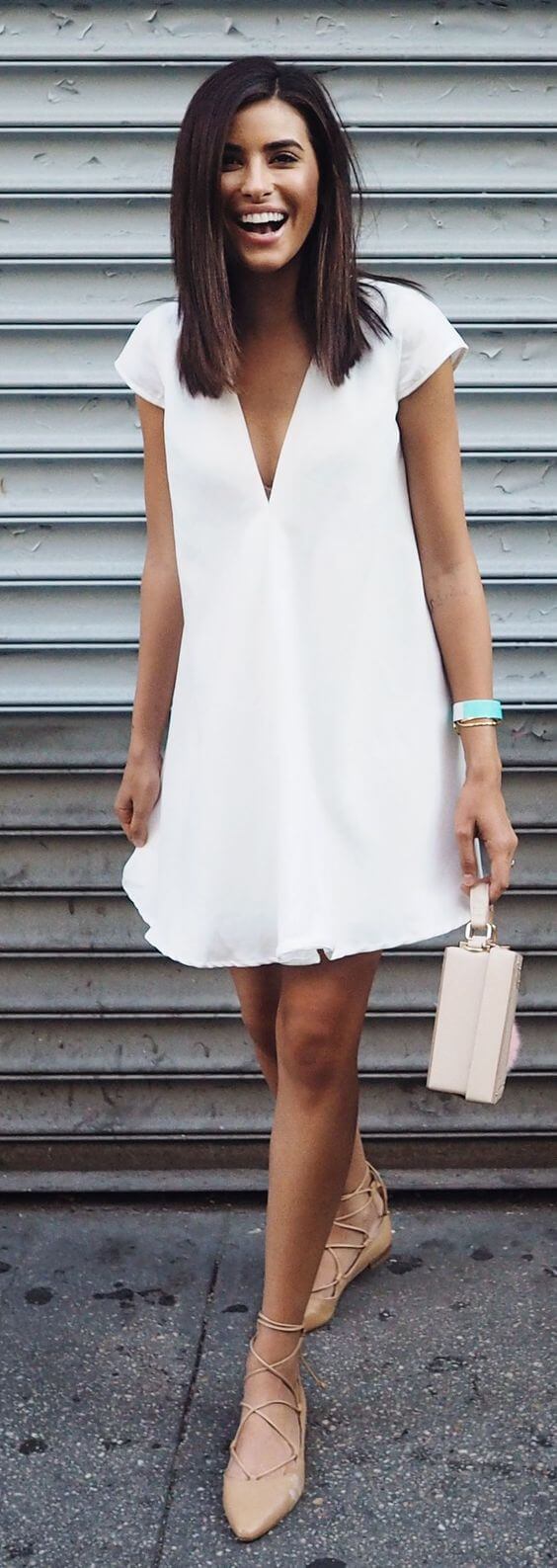 Simply beautiful: Strappy ballerina shoes are the perfect accompaniment to this effortless white tunic.