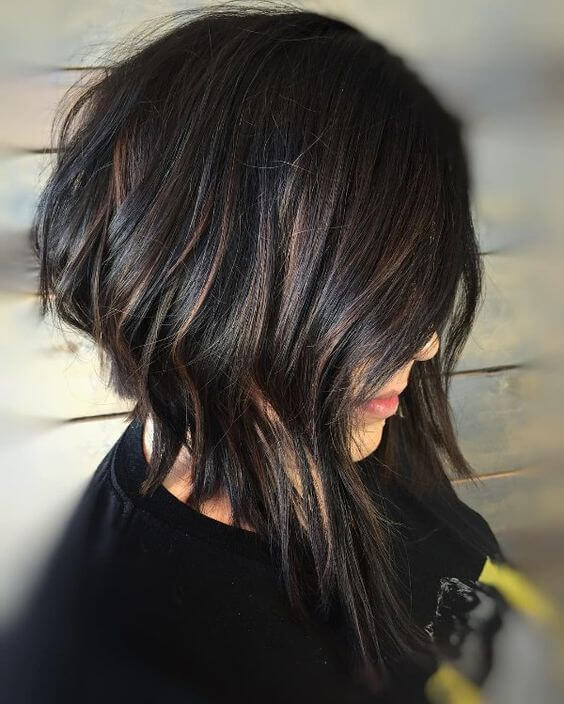 black layered bob with subtle copper highlights