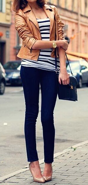 The streets are your catwalk in skinny denims and edgy brown leather.