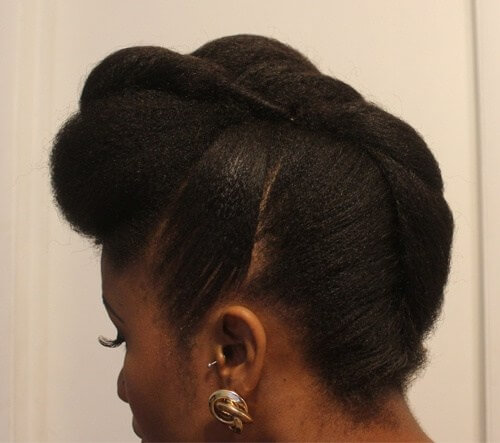 Play up your hair's texture with this funky twisted updo.