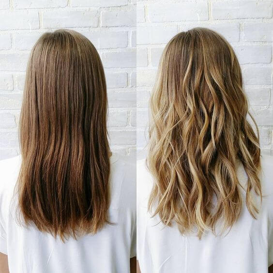 You can never go wrong with a sun-kissed look. Check out this side-by-side comparison of a woman's light brown hair before and golden blonde highlights after.