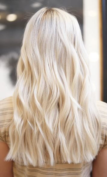 Get a head start on summer by choosing a yellow-blonde hairstyle like this one