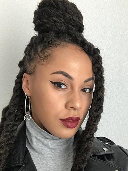 Huge Braids and a Top Knot