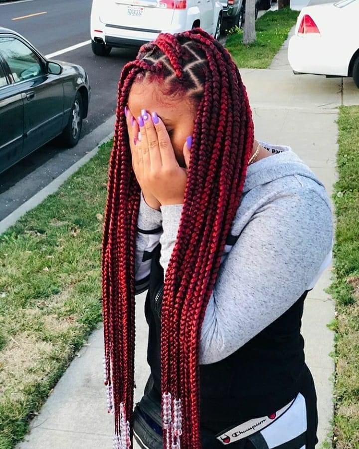 box braids with brown highlights