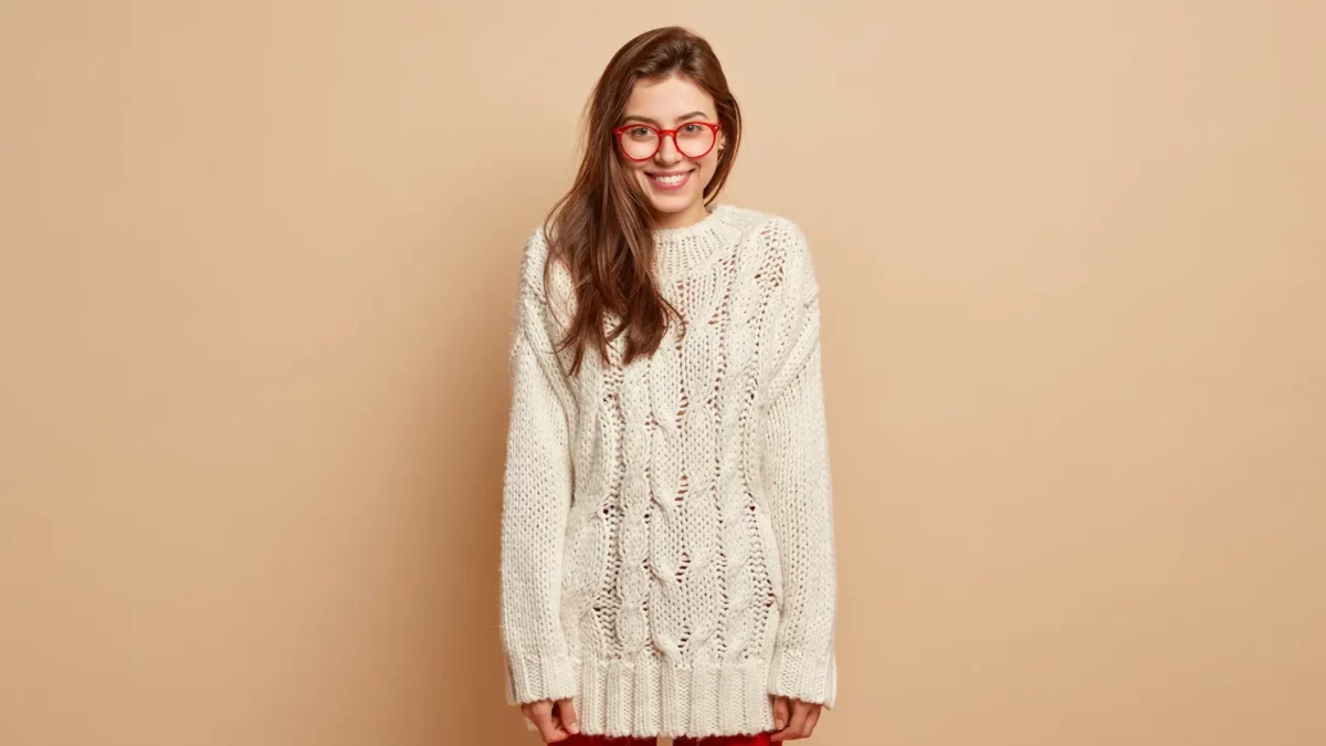 Woman in white knit sweater