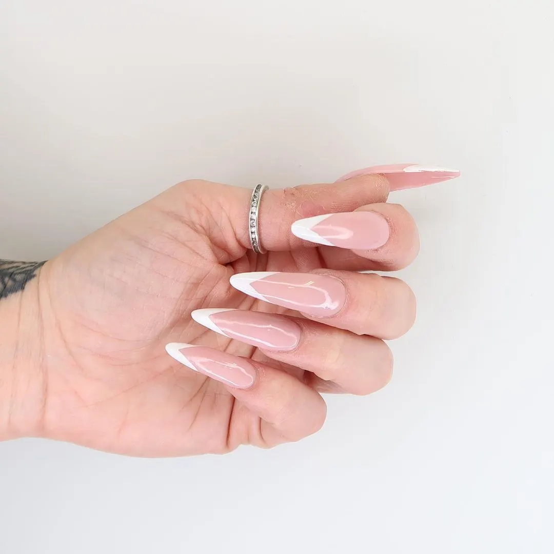 Stiletto nails with white tip