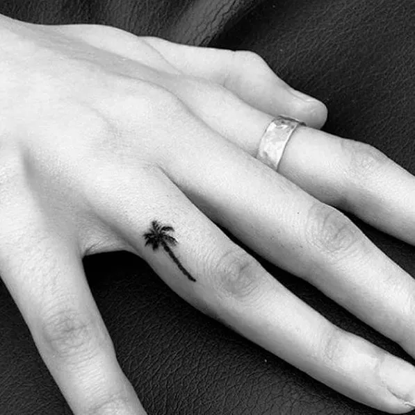 How about the miniature tattoo on one of your fingers?
