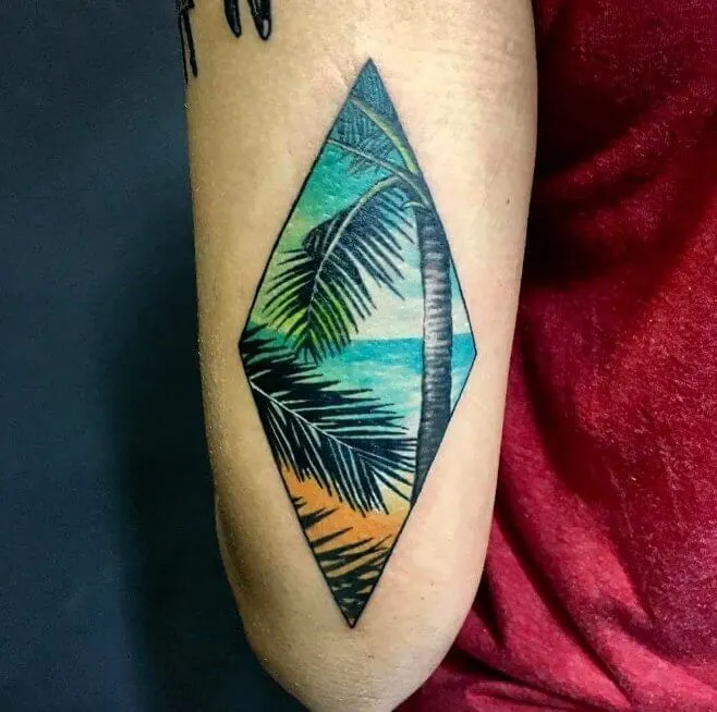 This diamond shaped tattoo will always remind you of seaside and beautiful palm trees