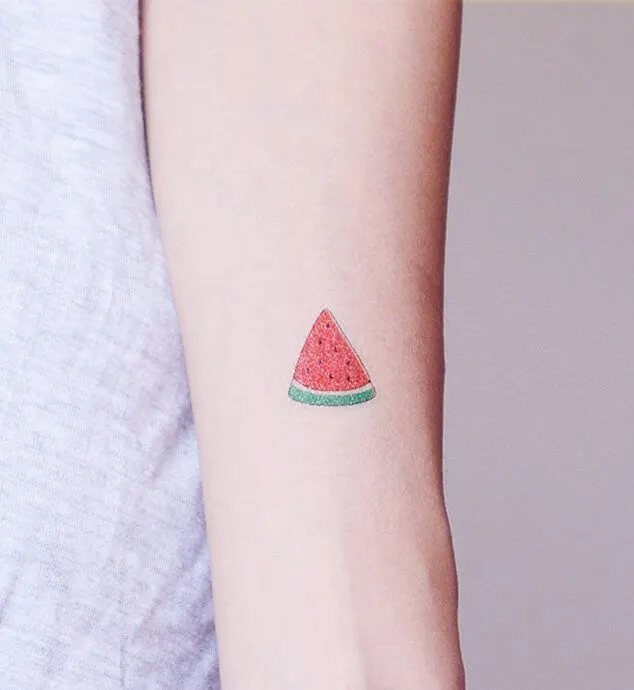 This small watermelon tattoo on your hand will always keep you smile. It is minimal but not it will not be unnoticed.